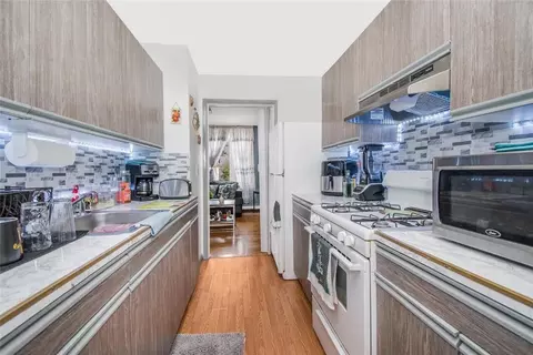 Kitchen - 446 E 146th St, New York, NY 10455 photo 1 of 1