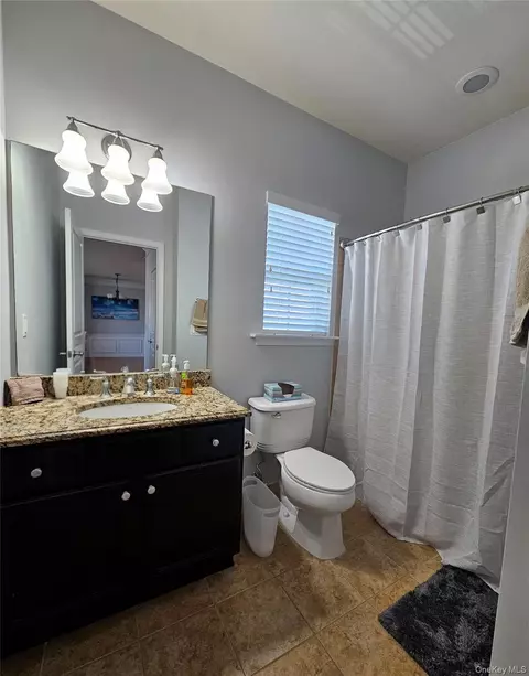 Bath - 124 Wildwood Cir, Holtsville, NY 11742 photo 1 of 4