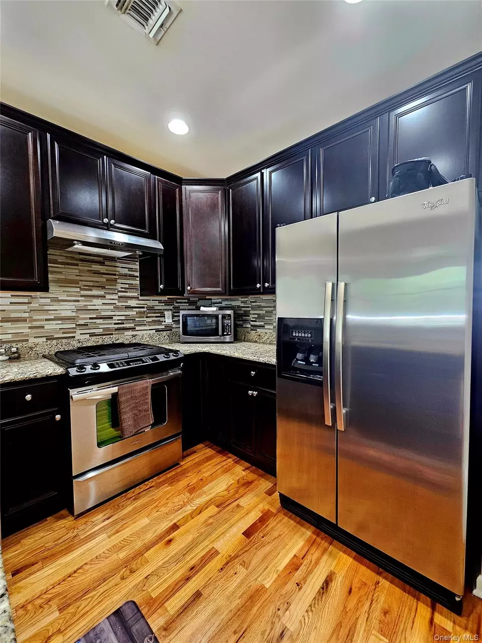 Kitchen - 124 Wildwood Cir, Holtsville, NY 11742 photo 2 of 3