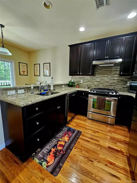 Kitchen - 124 Wildwood Cir, Holtsville, NY 11742 photo 1 of 3