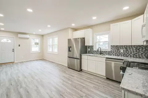 Living - 64 Highland Ave, Patchogue, NY 11772 photo 1 of 1