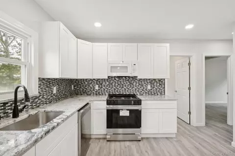 Kitchen - 64 Highland Ave, Patchogue, NY 11772 photo 2 of 2