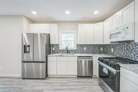 Kitchen - 64 Highland Ave, Patchogue, NY 11772 photo 1 of 2