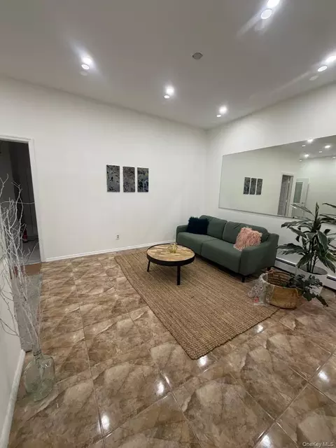 Living - 5814 58th Ave, New York, NY 11378 photo 2 of 4