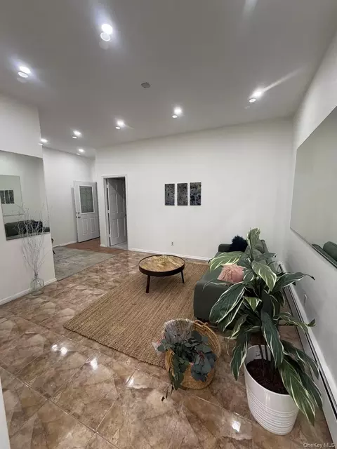 Living - 5814 58th Ave, New York, NY 11378 photo 3 of 4