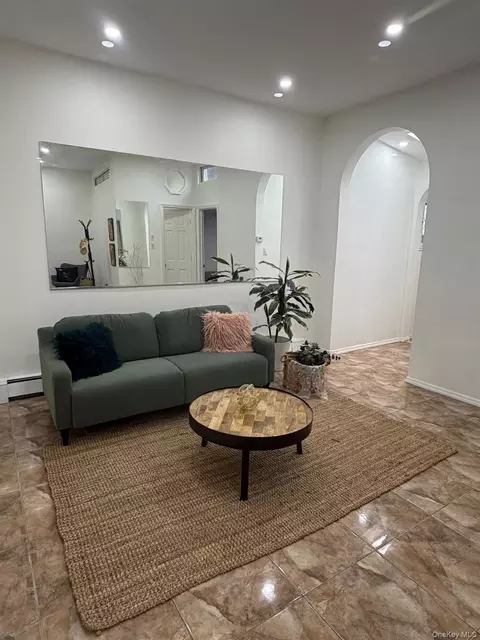 Living - 5814 58th Ave, New York, NY 11378 photo 4 of 4