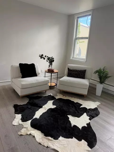 Living - 5814 58th Ave, New York, NY 11378 photo 1 of 4