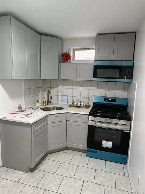Kitchen - 5814 58th Ave, New York, NY 11378 photo 2 of 3