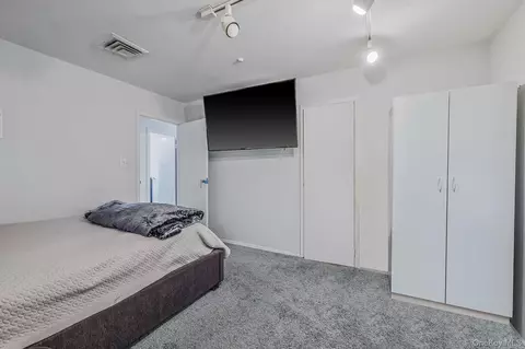 Bedroom - 19 Dumond Pl, Coram, NY 11727 photo 5 of 7