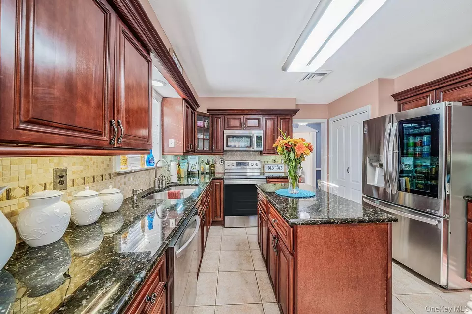 Kitchen - 28 Winfield Davis Dr, Coram, NY 11727 photo 3 of 3