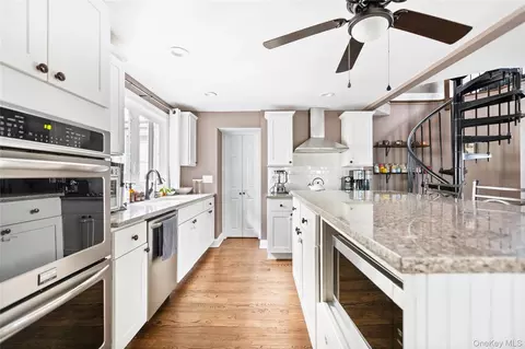 Kitchen - 10 Maple Ave, Patchogue, NY 11772 photo 3 of 3