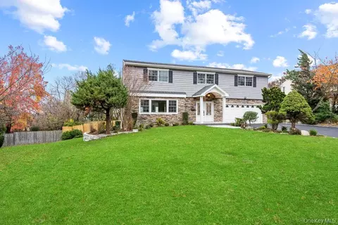 52 Woodland Rd, North Hempstead, NY 11576