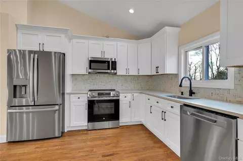 Kitchen - 116 Phyllis Dr, Patchogue, NY 11772 photo 2 of 3