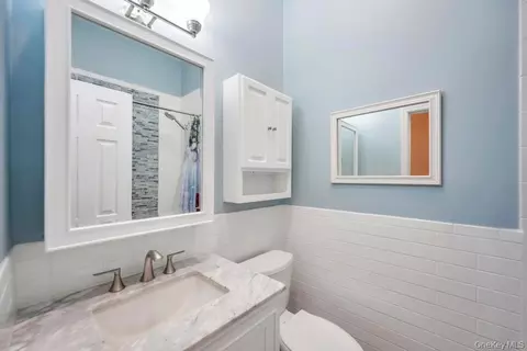 Bath - 220 Washington Ave, Patchogue, NY 11772 photo 2 of 2