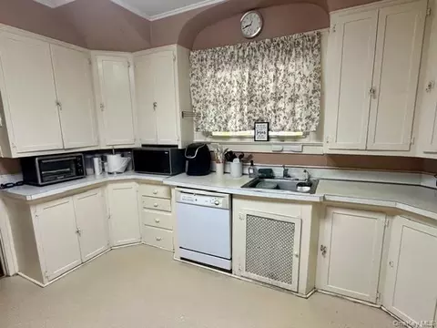 Kitchen - 90 E Roe Blvd, Patchogue, NY 11772 photo 2 of 2
