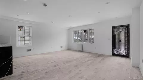 Living - 338 E 234th St, New York, NY 10470 photo 2 of 4