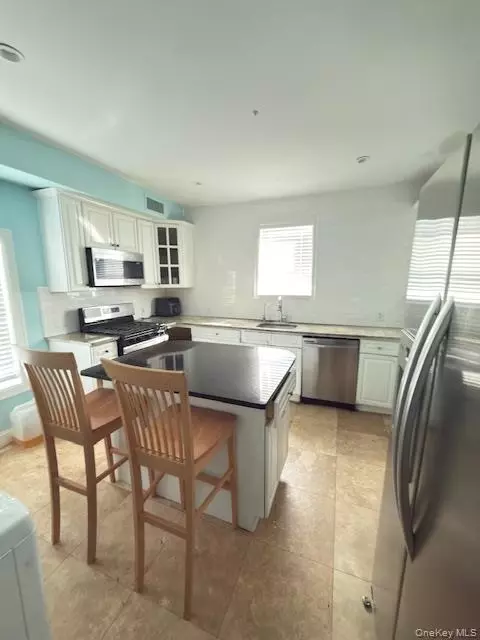 Kitchen - 48 Church St, Patchogue, NY 11772 photo 1 of 2