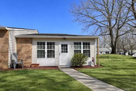 421 Weymouth Ct #D, Ridge, NY 11961