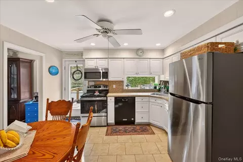 Kitchen - 52 Central Ave, Patchogue, NY 11772 photo 1 of 2