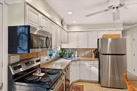 Kitchen - 52 Central Ave, Patchogue, NY 11772 photo 2 of 2