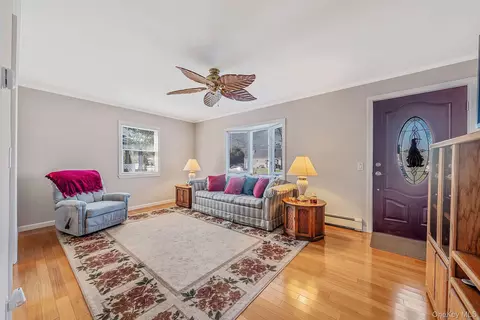 Living - 47 Thorburn Ave, Patchogue, NY 11772 photo 1 of 2