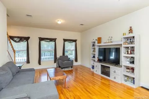 Living - 31 Barley Ln, Patchogue, NY 11772 photo 2 of 3