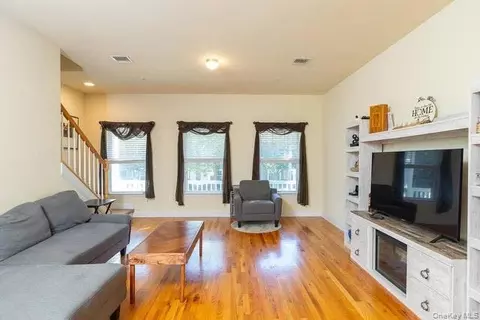 Living - 31 Barley Ln, Patchogue, NY 11772 photo 3 of 3