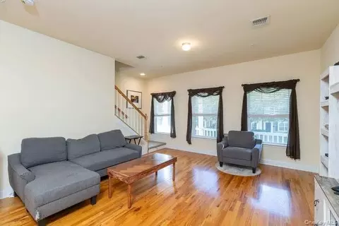 Living - 31 Barley Ln, Patchogue, NY 11772 photo 1 of 3