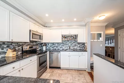 Kitchen - 40 W 4th St #206, Patchogue, NY 11772 photo 3 of 4