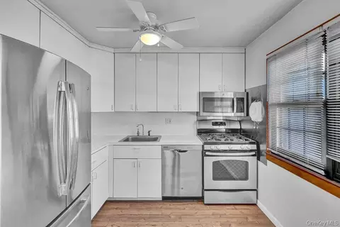 Kitchen - 228 Mariners Way, Copiague, NY 11726 photo 1 of 1