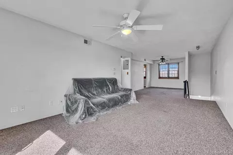Living - 228 Mariners Way, Copiague, NY 11726 photo 2 of 3
