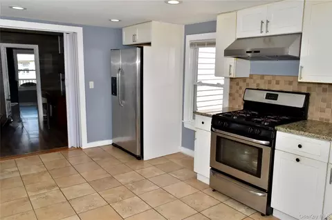 Kitchen - 32 Pearl St, Patchogue, NY 11772 photo 3 of 4