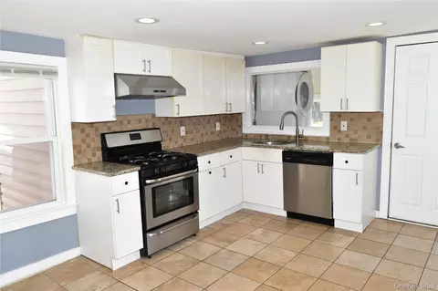 Kitchen - 32 Pearl St, Patchogue, NY 11772 photo 1 of 4