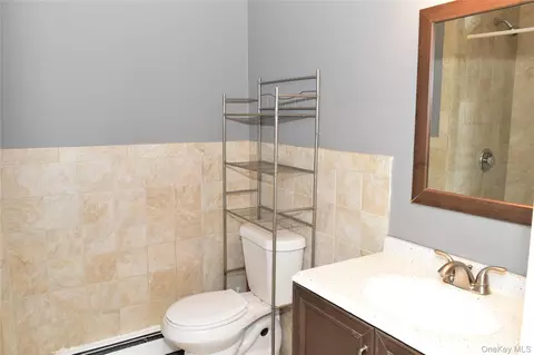 Bath - 32 Pearl St, Patchogue, NY 11772 photo 2 of 2
