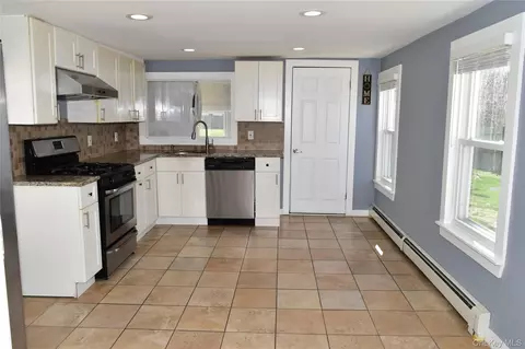 Kitchen - 32 Pearl St, Patchogue, NY 11772 photo 2 of 4