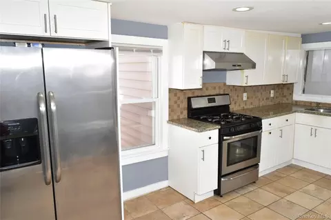 Kitchen - 32 Pearl St, Patchogue, NY 11772 photo 4 of 4