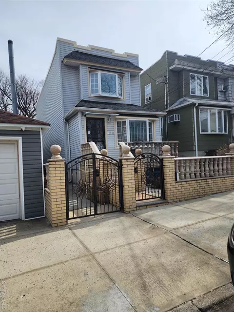 7711 64th Ln, New York, NY 11385