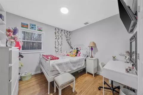 Bedroom - 231 W Woodside Ave, Patchogue, NY 11772 photo 1 of 4