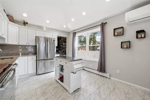 Kitchen - 205 Oak St, Patchogue, NY 11772 photo 2 of 3