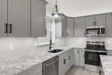 Kitchen - 21 Crawford Rd, Highland, NY 12528 photo 3 of 6