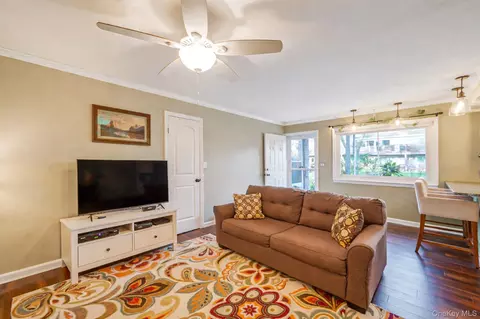 Living - 40 W 4th St #103, Patchogue, NY 11772 photo 2 of 2