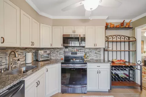 Kitchen - 40 W 4th St #103, Patchogue, NY 11772 photo 4 of 4