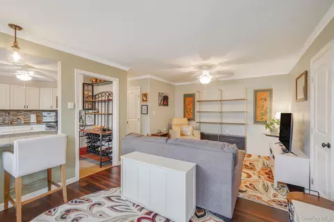 Living - 40 W 4th St #103, Patchogue, NY 11772 photo 1 of 2
