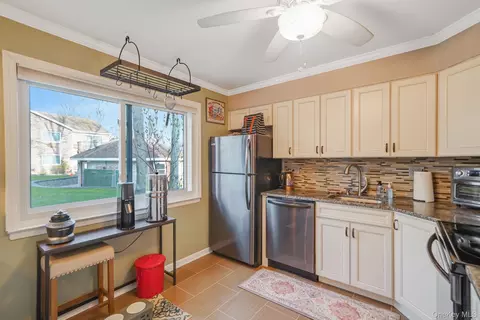 Kitchen - 40 W 4th St #103, Patchogue, NY 11772 photo 2 of 4