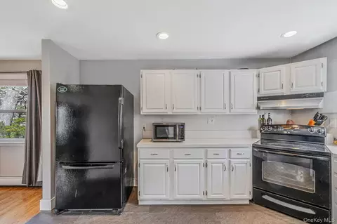 Kitchen - 30 Erving Ave, Brookhaven, NY 11772 photo 2 of 2