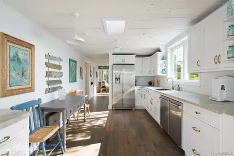 Kitchen - 9 Lakeland Ave, Patchogue, NY 11772 photo 3 of 3