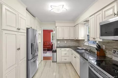 Kitchen - 15 Oxbow Rd, Patchogue, NY 11772 photo 2 of 5