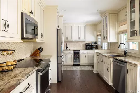 Kitchen - 115 Shore Rd, Patchogue, NY 11772 photo 1 of 3
