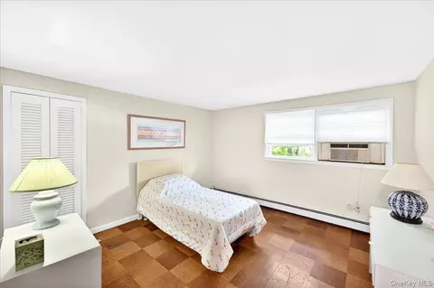 Bedroom - 52 N Pinelake Dr, Patchogue, NY 11772 photo 3 of 5