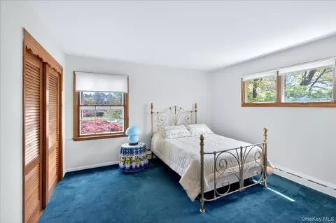 Bedroom - 52 N Pinelake Dr, Patchogue, NY 11772 photo 2 of 5